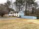 Ranch house with fenced yard and long driveway at 3464 Creatwood Se Trl, Smyrna, GA 30080