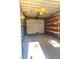 Garage with overhead storage and painted floor at 3464 Creatwood Se Trl, Smyrna, GA 30080