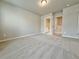 Bedroom with carpet flooring and doors to bathroom and closet at 5435 Rock Place Ct # 38, Norcross, GA 30093