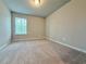 Bedroom with carpet flooring, neutral wall color and a window at 5435 Rock Place Ct # 38, Norcross, GA 30093