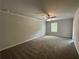 Bedroom with ceiling fan and neutral-colored carpet at 11045 Shadow Creek Ter, Hampton, GA 30135