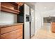 Kitchen with granite countertops and stainless steel fridge at 320 Six Branches Ct, Roswell, GA 30076