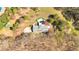 Aerial view of house with inground pool, large yard, and surrounding trees at 850 Thurman Rd, Stockbridge, GA 30281