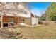 Backyard exterior features a patio, storage building, and brick wall at 850 Thurman Rd, Stockbridge, GA 30281