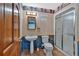 Bathroom featuring a pedestal sink and a glass enclosed shower at 850 Thurman Rd, Stockbridge, GA 30281