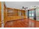 Spacious bedroom featuring hardwood floors, custom built-ins, and a window at 850 Thurman Rd, Stockbridge, GA 30281