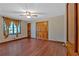 Spacious bedroom featuring hardwood floors, a ceiling fan and a large closet at 850 Thurman Rd, Stockbridge, GA 30281