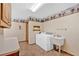 Laundry room with a sink and modern washer and dryer units at 850 Thurman Rd, Stockbridge, GA 30281
