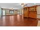 Large living room with hardwood floors, a window and cabinet at 850 Thurman Rd, Stockbridge, GA 30281