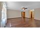 Large open living room featuring hardwood floors, soft neutral walls, and a ceiling fan at 850 Thurman Rd, Stockbridge, GA 30281