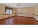 Well-lit living room featuring hardwood floors and chandelier at 850 Thurman Rd, Stockbridge, GA 30281