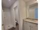 Bathroom with granite countertop, shower, and toilet at 140 Tye St, Stockbridge, GA 30281