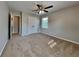 Bright bedroom with ceiling fan and double-door closet at 532 Greg Sw Dr, Lilburn, GA 30047