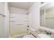 Clean bathroom featuring a shower/tub combo, granite countertop, and built-in shelving at 205 Ridge Run, Stockbridge, GA 30281