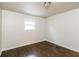 Bright bedroom with dark brown wood flooring and window at 205 Ridge Run, Stockbridge, GA 30281