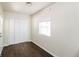 Bright bedroom with dark brown wood flooring and closet at 205 Ridge Run, Stockbridge, GA 30281