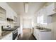 Modern kitchen with granite countertops and stainless steel appliances at 205 Ridge Run, Stockbridge, GA 30281