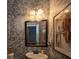 Stylish bathroom with unique wallpaper and vanity at 2353 Maplewood Se Ct # 25, Atlanta, GA 30339