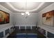 Elegant dining room with chandelier and wainscoting at 2353 Maplewood Se Ct # 25, Atlanta, GA 30339