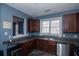 Well-organized kitchen with ample counter space and practical layout for efficient cooking and storage at 2353 Maplewood Se Ct # 25, Atlanta, GA 30339