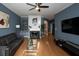 Spacious living room features a fireplace, hardwood floors, and stylish decor, creating a warm and inviting atmosphere at 2353 Maplewood Se Ct # 25, Atlanta, GA 30339