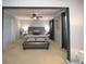 Large main bedroom with king bed and sitting area at 2353 Maplewood Se Ct # 25, Atlanta, GA 30339