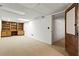 Finished basement with built-in shelving and office area at 3781 Hickory Ridge Ct, Marietta, GA 30066