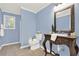 Bathroom with tiled floor, vanity, and window at 4692 Yeager Rd, Douglasville, GA 30135