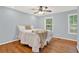 Bright bedroom with hardwood floors and ample natural light at 4692 Yeager Rd, Douglasville, GA 30135