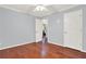 Light-filled bedroom with hardwood floors and ceiling fan at 4692 Yeager Rd, Douglasville, GA 30135