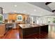 Spacious kitchen featuring granite countertops, stainless steel appliances, and hardwood floors at 4692 Yeager Rd, Douglasville, GA 30135