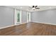 Spacious living room featuring hardwood floors and a ceiling fan at 4692 Yeager Rd, Douglasville, GA 30135