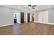 Large living area with hardwood floors and barn doors at 4692 Yeager Rd, Douglasville, GA 30135