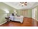 Bright main bedroom featuring hardwood floors and ample natural light at 4692 Yeager Rd, Douglasville, GA 30135