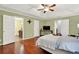 Spacious main bedroom with hardwood floors and ensuite bathroom access at 4692 Yeager Rd, Douglasville, GA 30135