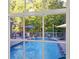 Inviting pool view from inside the house, featuring a deck and umbrellas at 4692 Yeager Rd, Douglasville, GA 30135