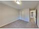 Bright bedroom with double-door closet and carpet at 550 Jodeco Station St, Stockbridge, GA 30281