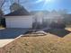 Ranch style home with attached garage and landscaping at 550 Jodeco Station St, Stockbridge, GA 30281