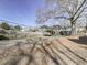 Large backyard with gravel and a wooden structure at 731 E Main St, Canton, GA 30114