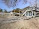 Backyard view showing a deck and stairs leading down at 731 E Main St, Canton, GA 30114