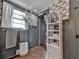 Stylish bathroom with white wicker shelf and bird wallpaper at 731 E Main St, Canton, GA 30114