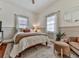 Cozy bedroom with neutral decor and built-in shelving at 731 E Main St, Canton, GA 30114