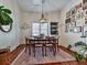 Charming dining room features a wood table, built-in shelving, and gallery wall at 731 E Main St, Canton, GA 30114