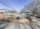 Landscaped front yard with a stone pathway and wooden fence at 731 E Main St, Canton, GA 30114