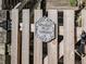 Close-up of wooden garden gate with welcoming sign at 731 E Main St, Canton, GA 30114