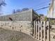 Wooden garden gate with welcoming sign at 731 E Main St, Canton, GA 30114