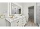 Elegant bathroom with double vanity, marble countertop, and gold fixtures at 4389 Bradley Dr, Snellville, GA 30039