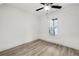 Well-lit bedroom featuring a ceiling fan and large window at 4389 Bradley Dr, Snellville, GA 30039