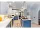 Two-toned kitchen with island, stainless steel appliances, and subway tile at 648 Cooledge Ne Ave, Atlanta, GA 30306