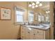 Bright bathroom boasts granite countertops, white cabinets, and a spacious layout at 1103 Ridenour Ct, Kennesaw, GA 30152